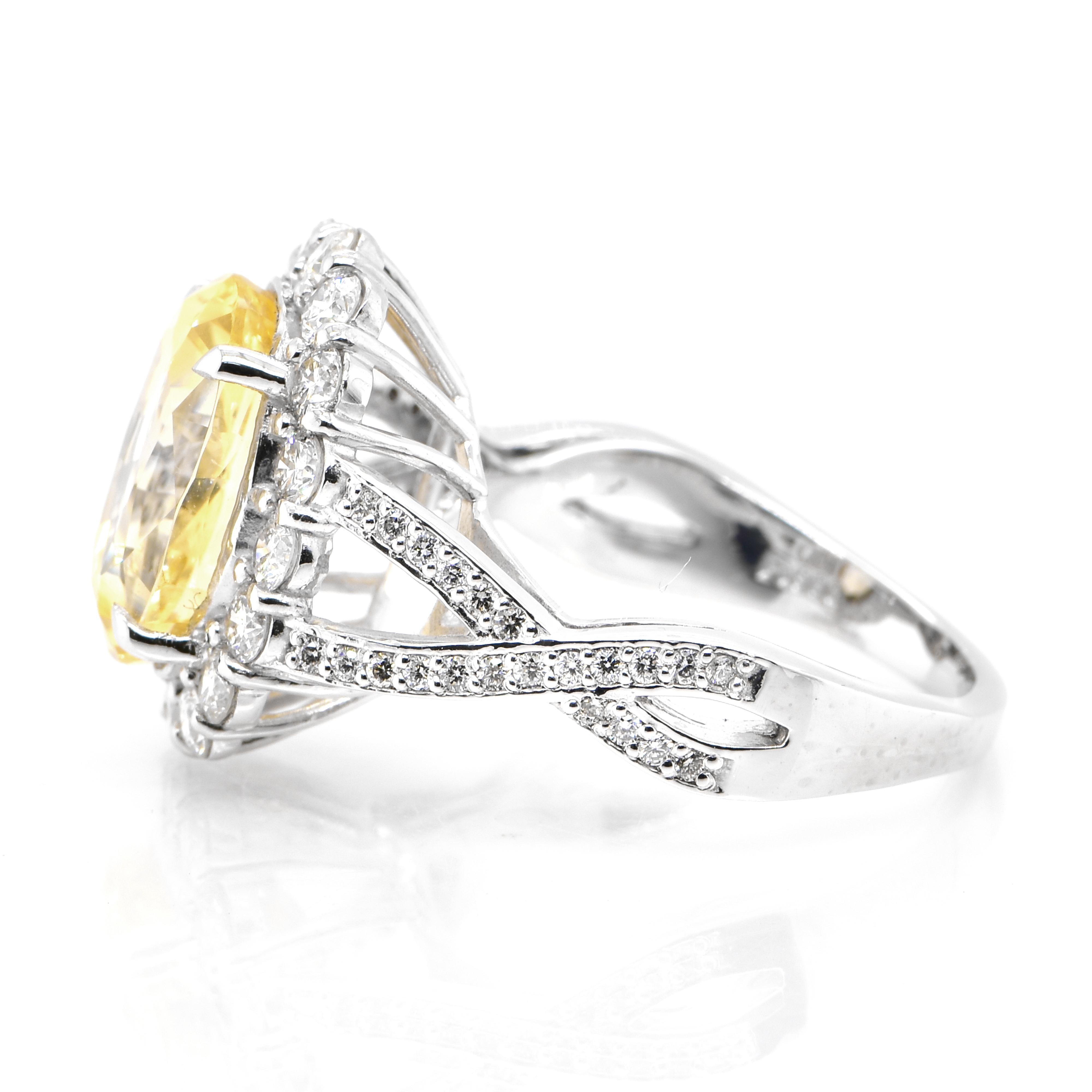 Oval Cut GIA Certified 7.33 Carat Unheated Yellow Sapphire & Diamond Ring set in Platinum For Sale