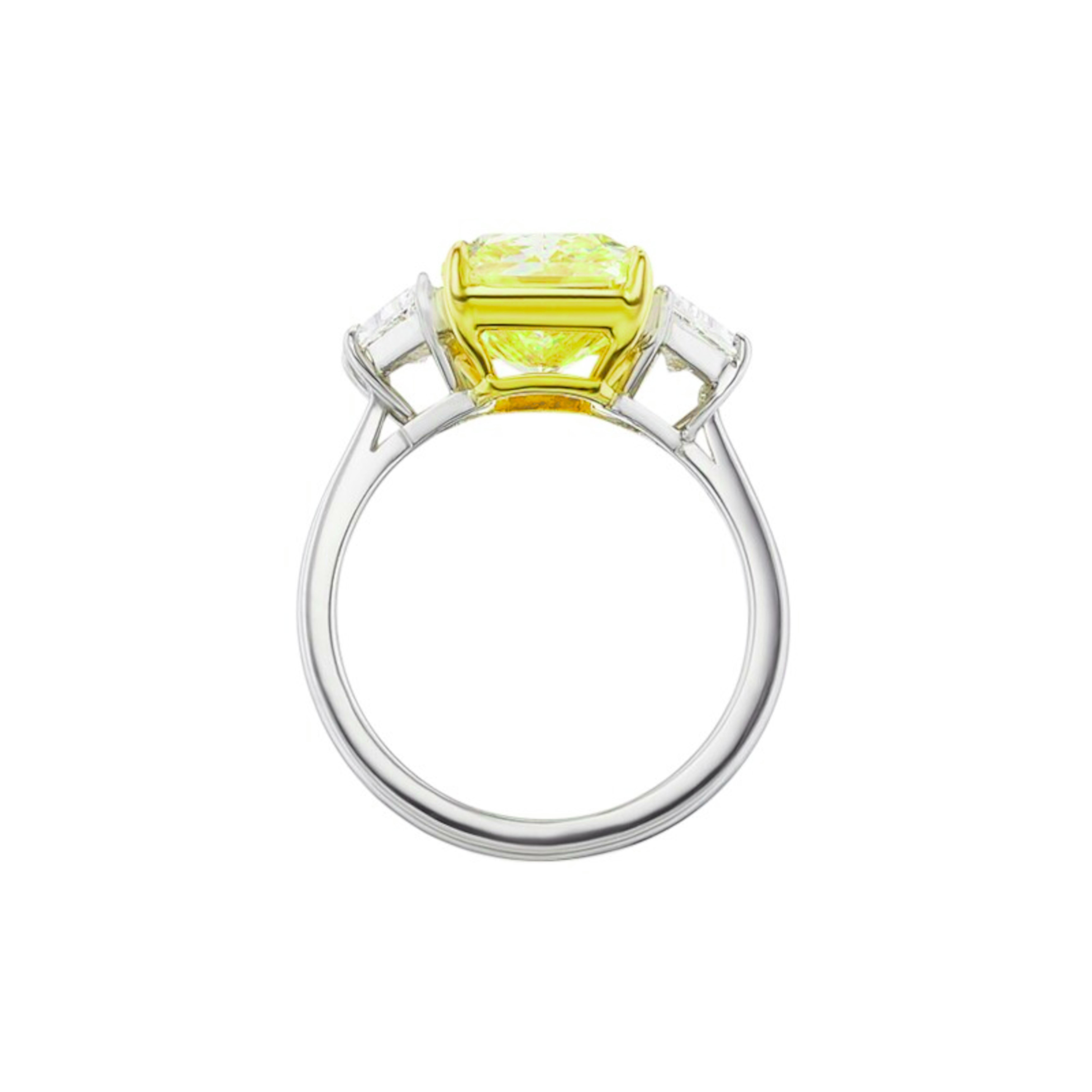 A masterpiece of timeless elegance, this estate diamond ring showcases a breathtaking GIA-certified 7.38-carat radiant-cut diamond. With its fancy intense yellow color and VVS2 clarity, this diamond radiates exceptional brilliance while maintaining