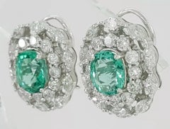 GIA Certified 7.38 ct Total Weight Oval Paraiba Tourmaline & Diamond Earrings