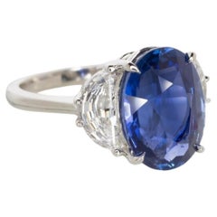 GIA Certified 7.39 Carat VIVID Blue Unheated Sapphire Engagement Ring