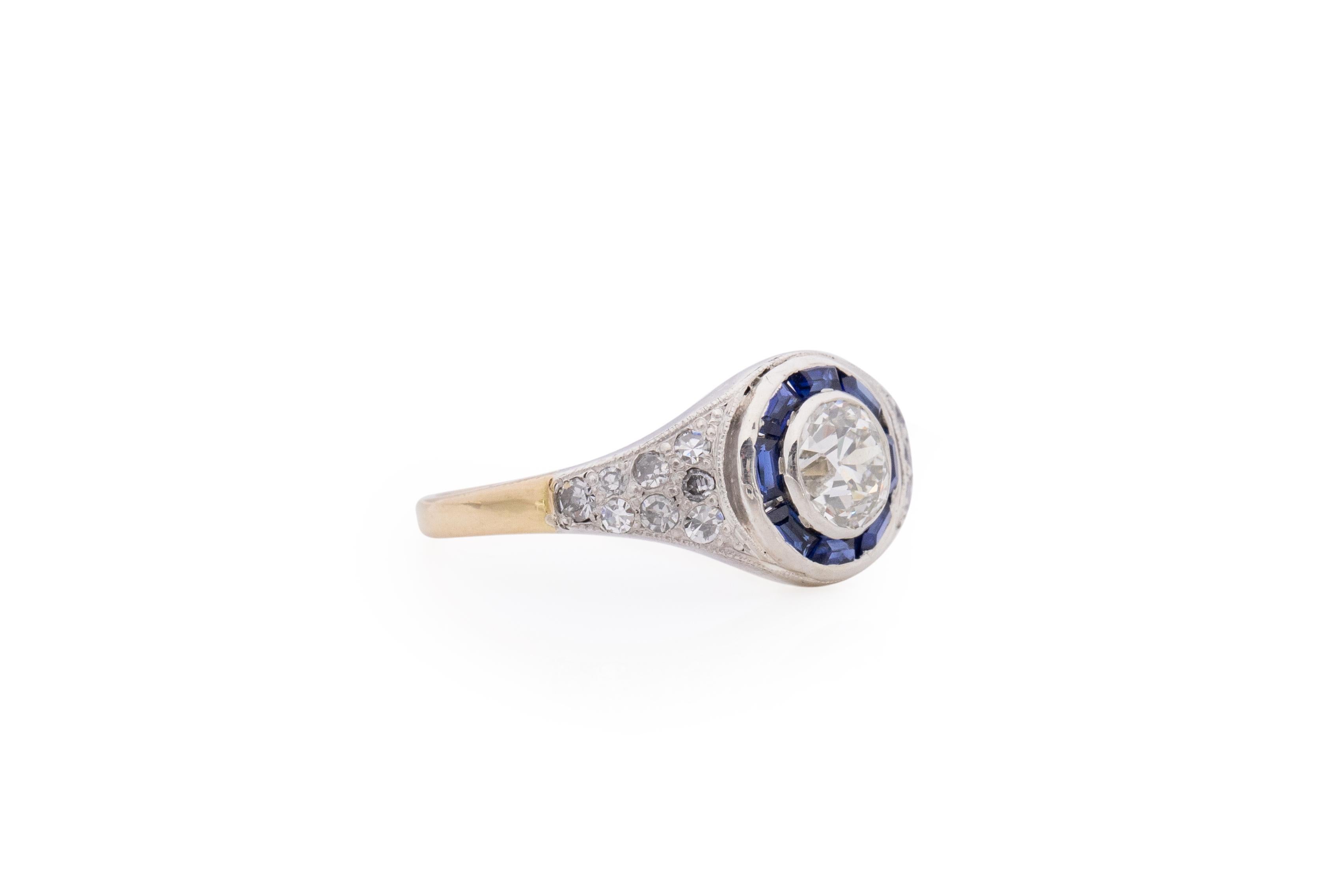 Item Details: 
Ring Size: 7
Metal Type: Platinum & 18 Karat Yellow Gold [Hallmarked, and Tested]
Weight: 2.8 grams

Center Diamond Details:
GIA REPORT #: 2213425898
Weight: .74 carat
Cut: Old European brilliant
Color: J
Clarity: VS1
Measurements: