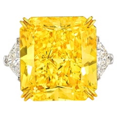 Certifié GIA, 7.40 ct. Fantaisie  Bague de fiançailles platine avec diamant jaune