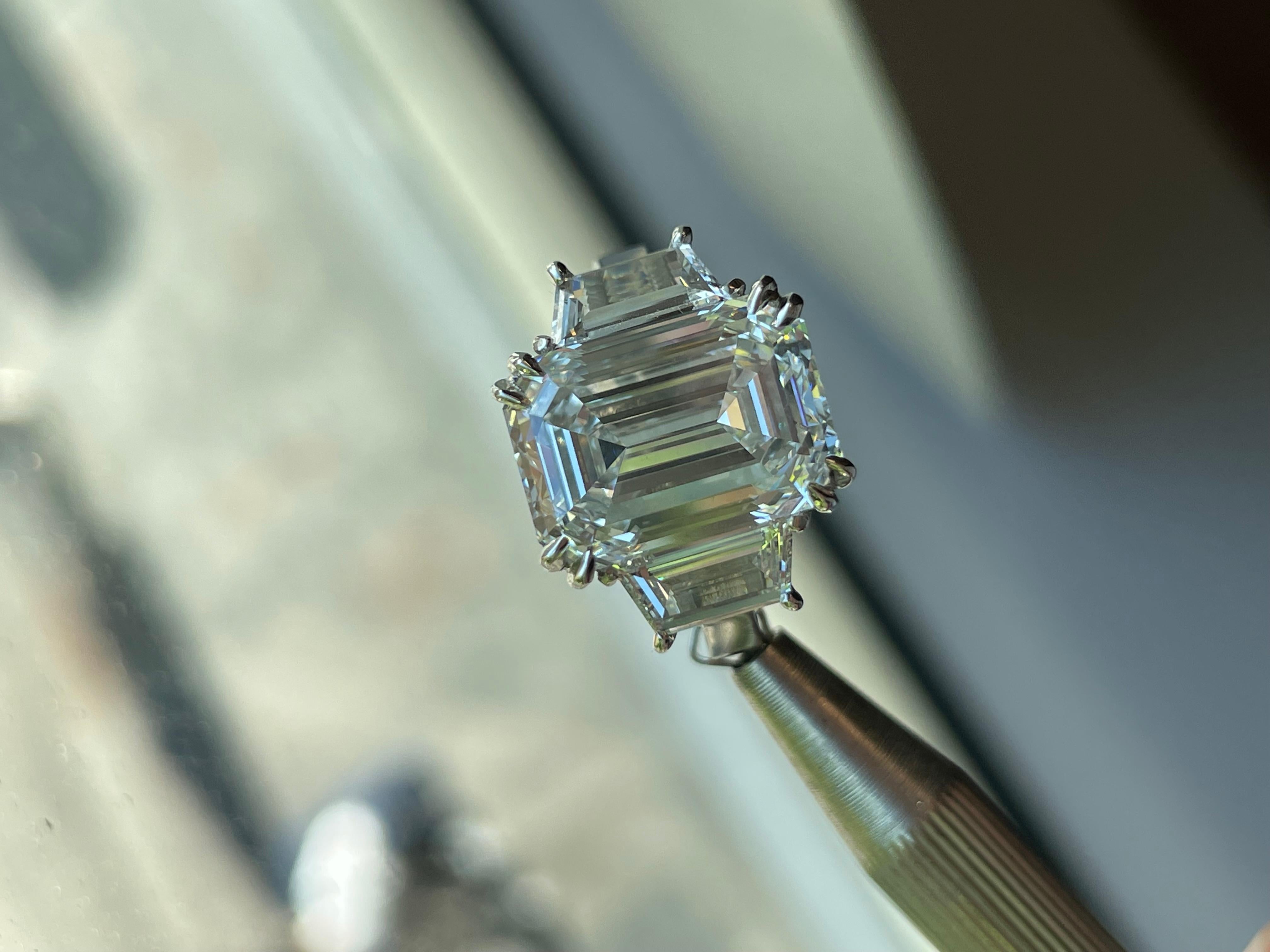 Extraordinary 7.41 Carat Emerald Cut Diamond Engagement Ring

Setting:
Platinum

Center Stone: GIA Certified Emerald Cut Diamond
Carat Weight: 7.41
Clarity: VSS1
Color: H

Side Stones: Trapezoid Cut Diamonds
Color: G-H
Clarity: VS
Cut: Excellent
The