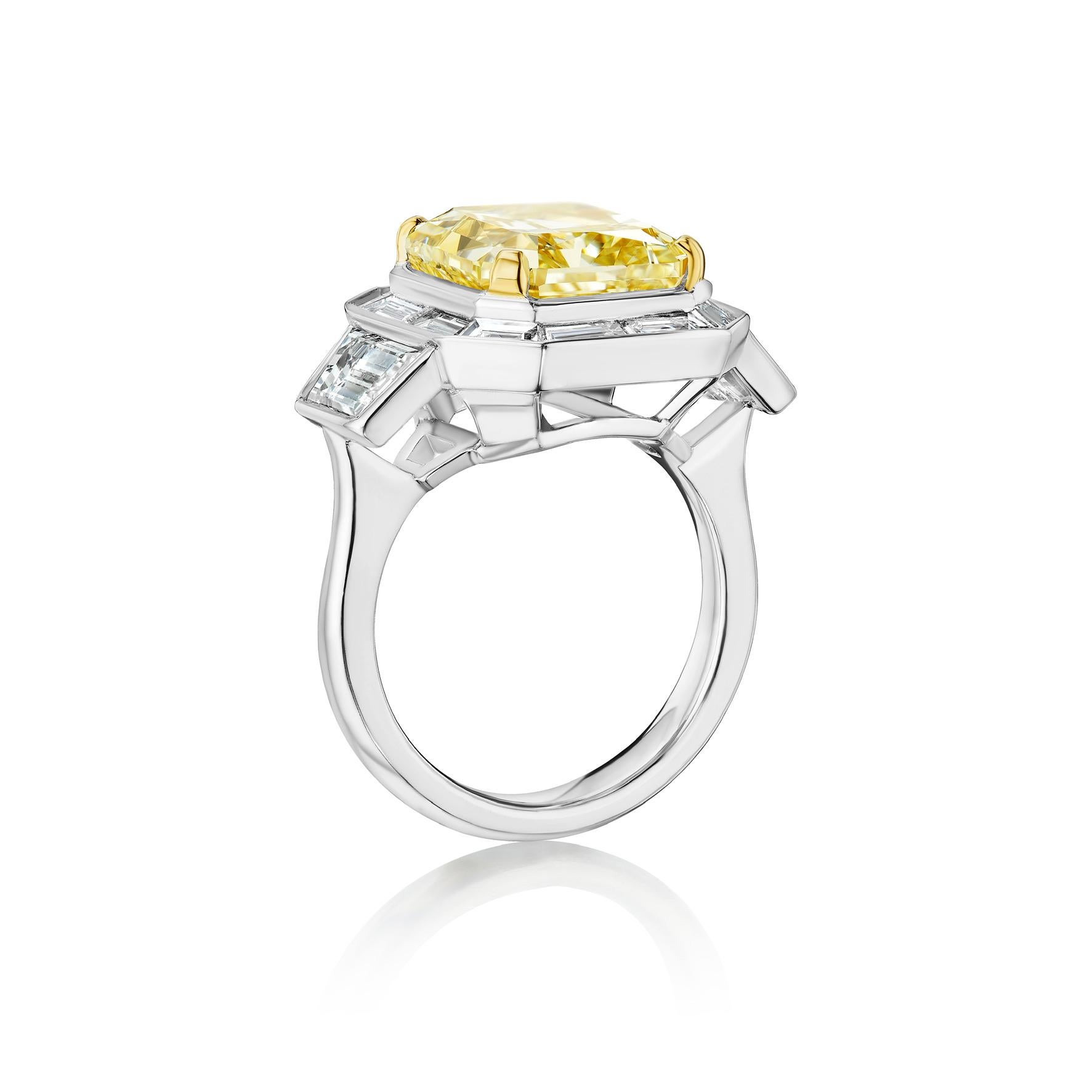 Radiant Cut GIA Certified 7.43 Carat Yellow Diamond and Baguette Halo Ring For Sale