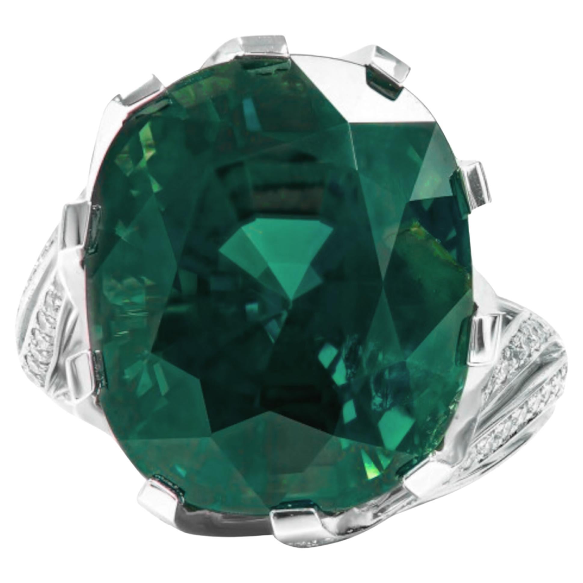Bague avec diamant émeraude certifiée GIA de 7.44 carats en vente