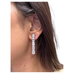 Issac Nussbaum 7.47 Carat Total Weight Platinum Emerald Cut Diamond Earrings.
