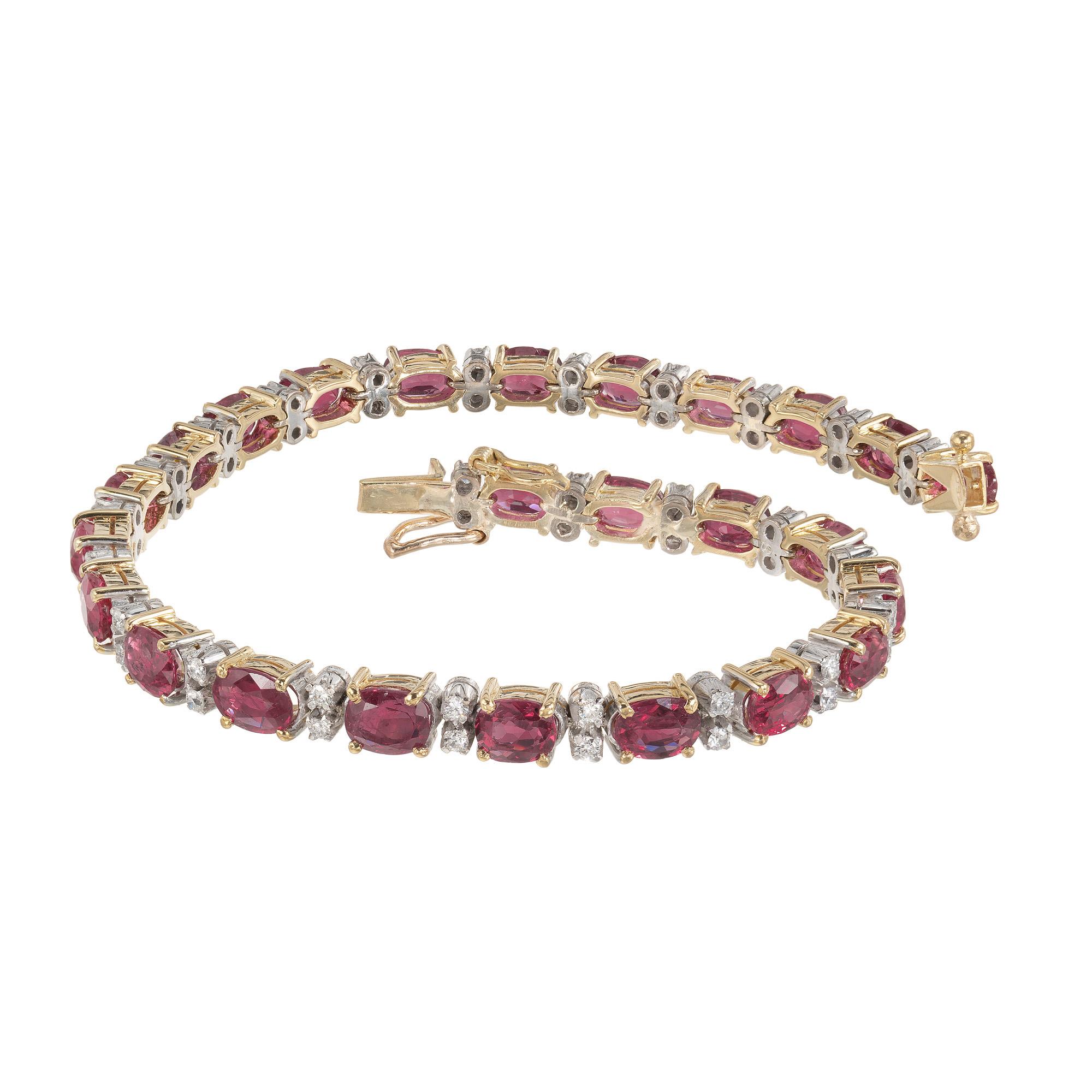 Ruby and diamond gold tennis bracelet. Set with 25 oval shaped rubies that alternate with 50 round brillint cut diamonds in a double formation. The rubies have an approximate total carat weight of 7.5cts. The bracelet measures at 7 inches and is