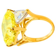 GIA Certified 7.50 Carat Fancy Intense Yellow Radiant 18K Yellow Gold Ring