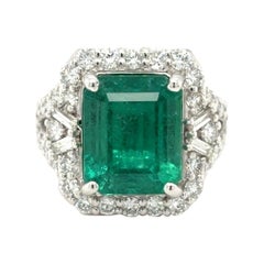 GIA Certified 7.52 Carat Octagon Cut Emerald Diamond Cocktail Ring