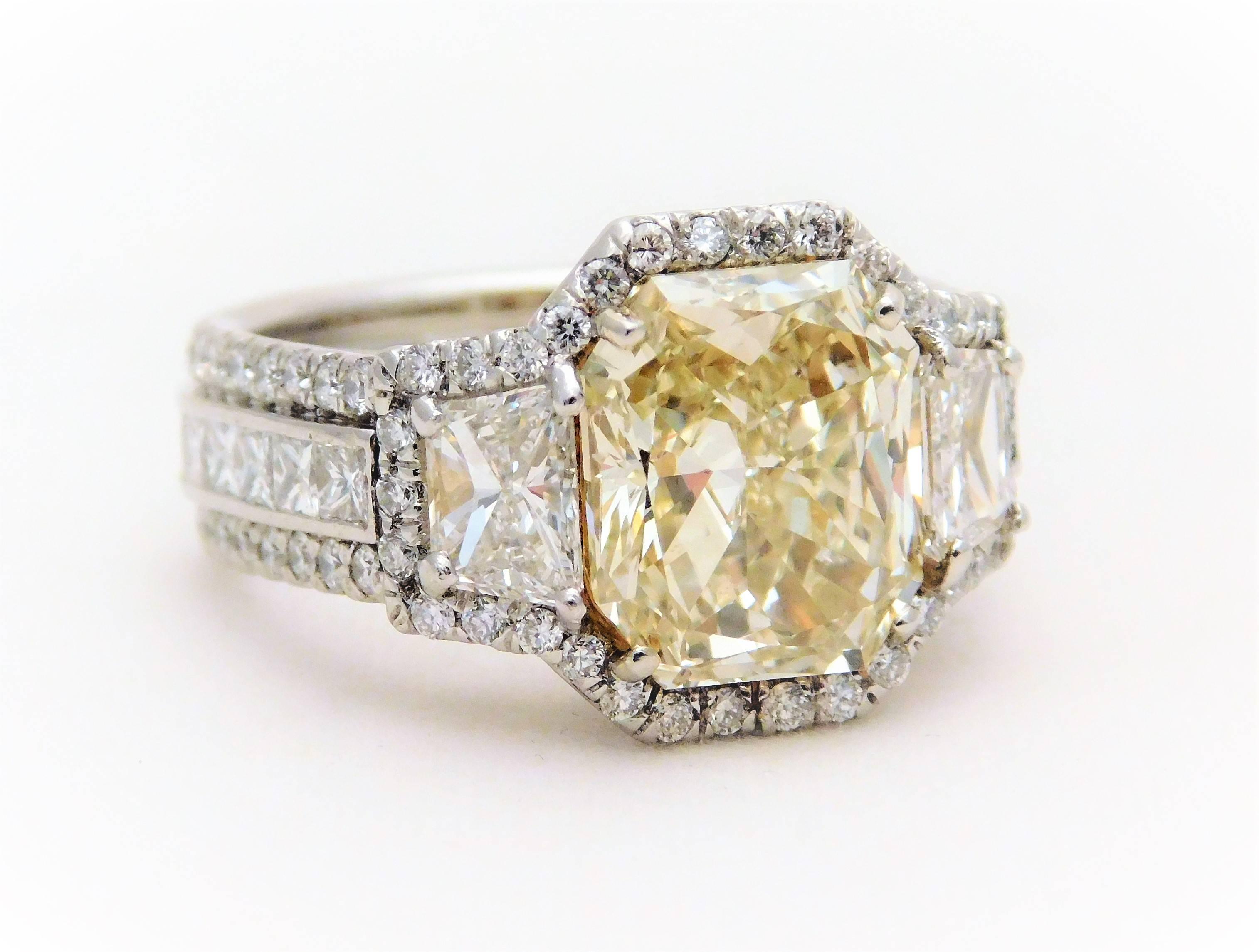 Modern GIA Certified 7.57 Carat Handmade Radiant Cut Canary Yellow Diamond Ring For Sale