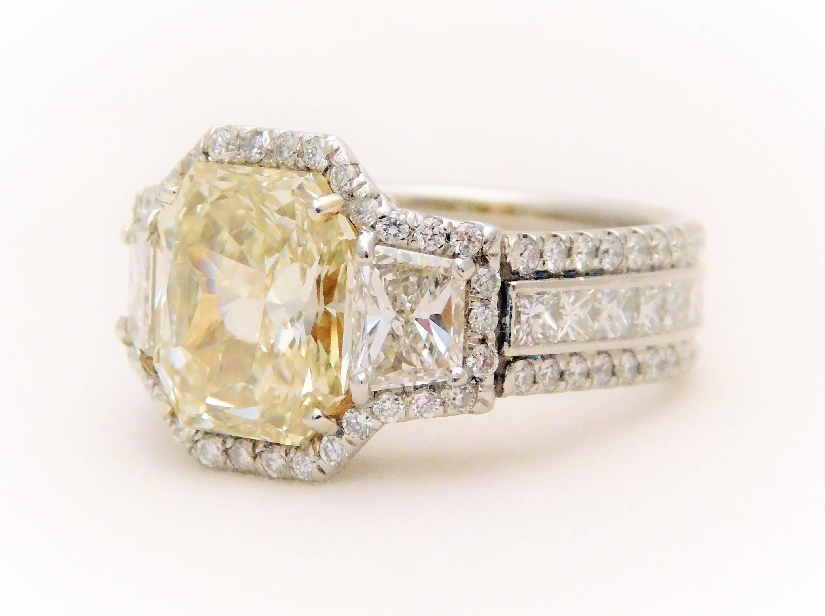 GIA Certified 7.57 Carat Handmade Radiant Cut Canary Yellow Diamond Ring In New Condition For Sale In Metairie, LA