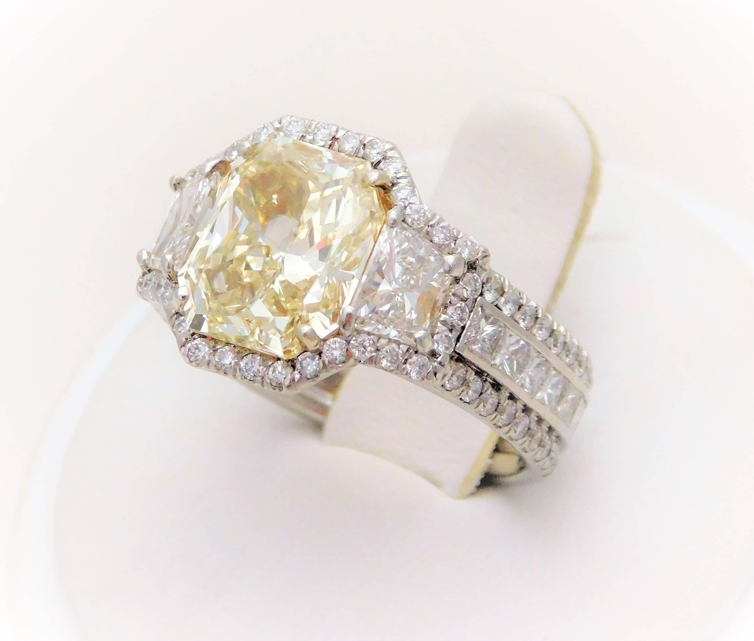 GIA Certified 7.57 Carat Handmade Radiant Cut Canary Yellow Diamond Ring For Sale 2