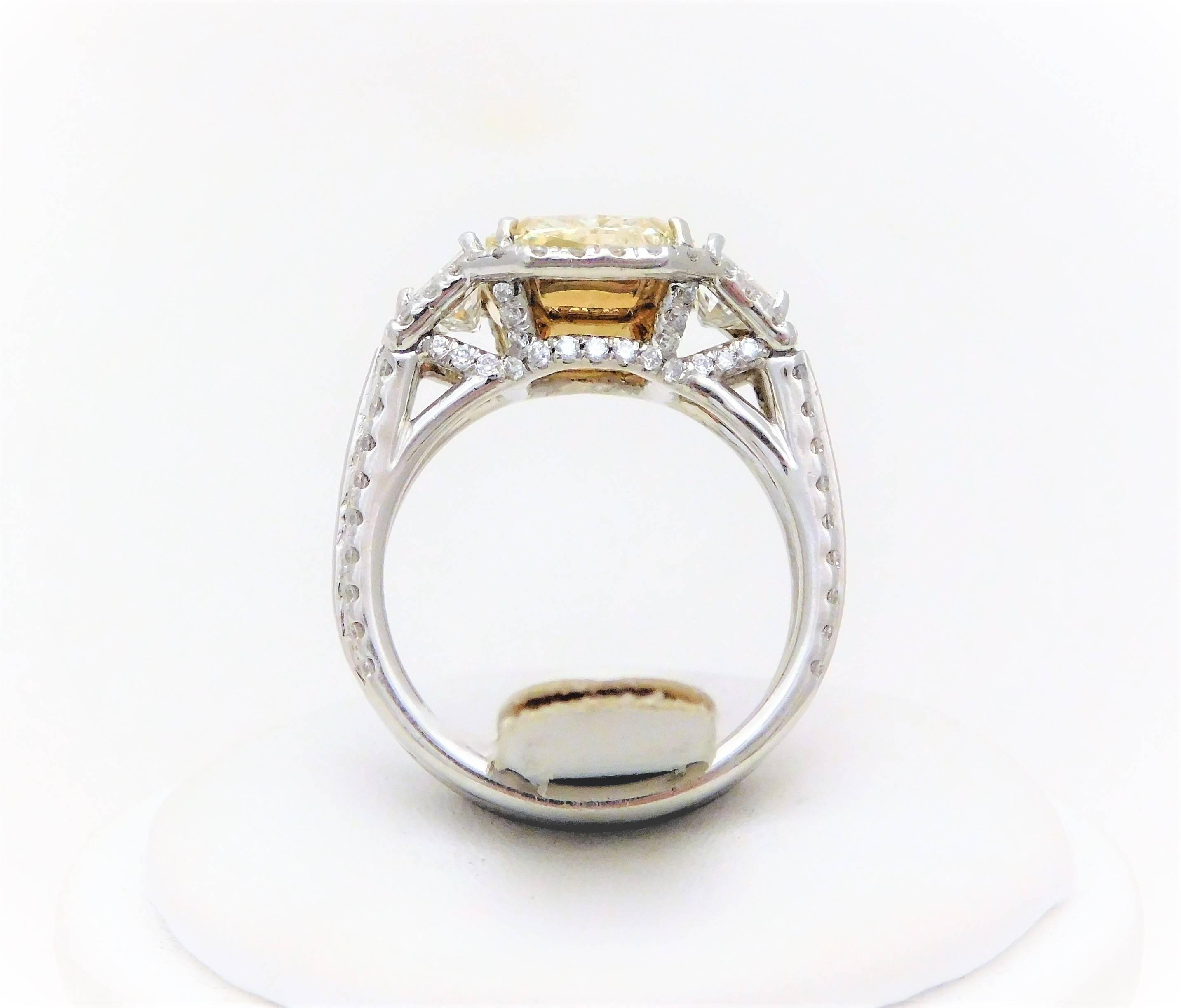 GIA Certified 7.57 Carat Handmade Radiant Cut Canary Yellow Diamond Ring For Sale 4