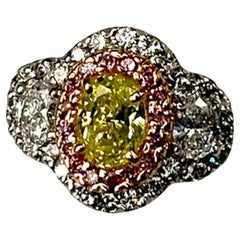 GIA Certified .75Ct Oval Fancy Intense Yellow Green Diamond Ring