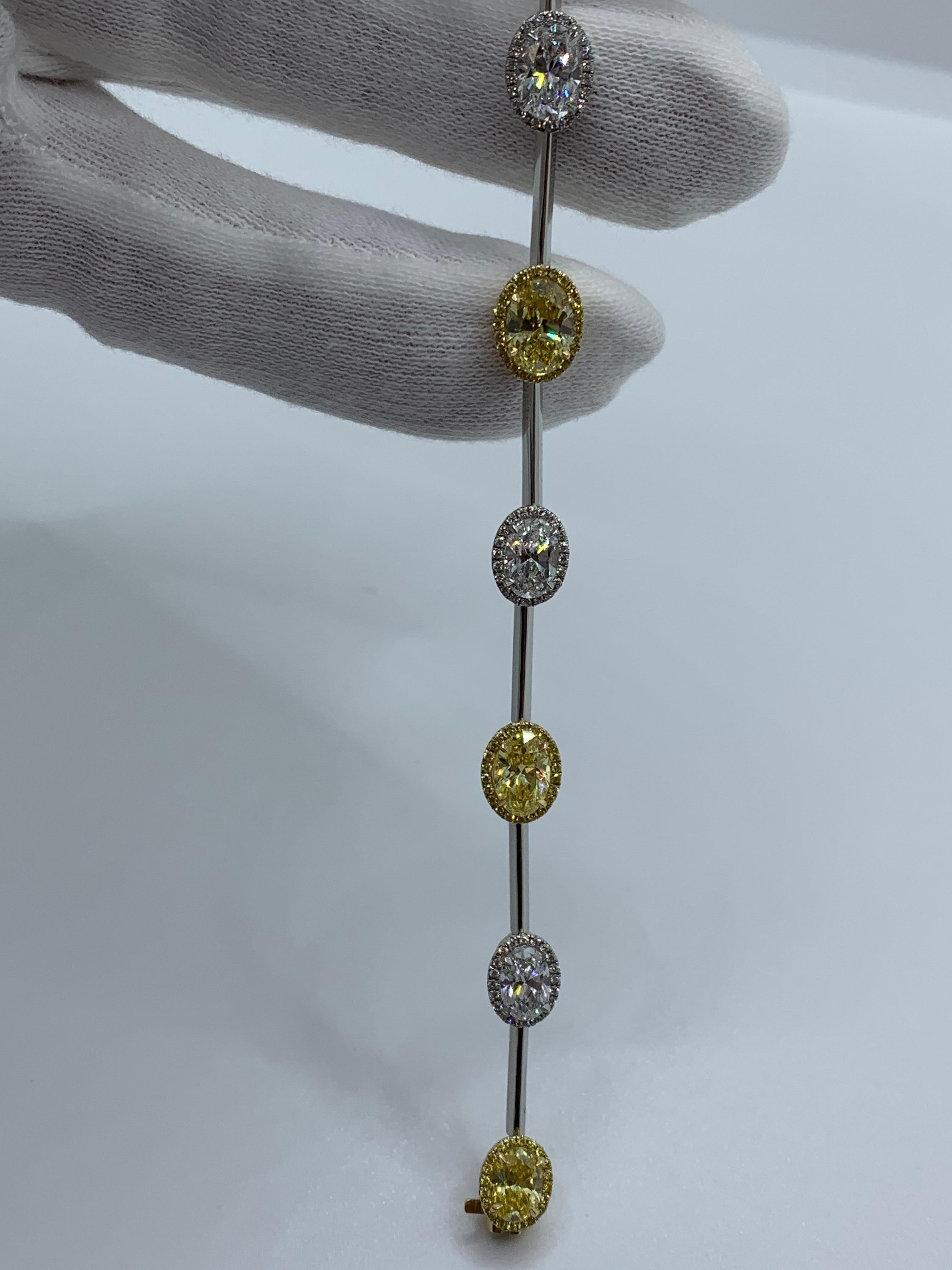 GIA Certified 7.61 Carat Fancy Yellow and White Oval Diamond Bracelet In New Condition For Sale In New York, NY