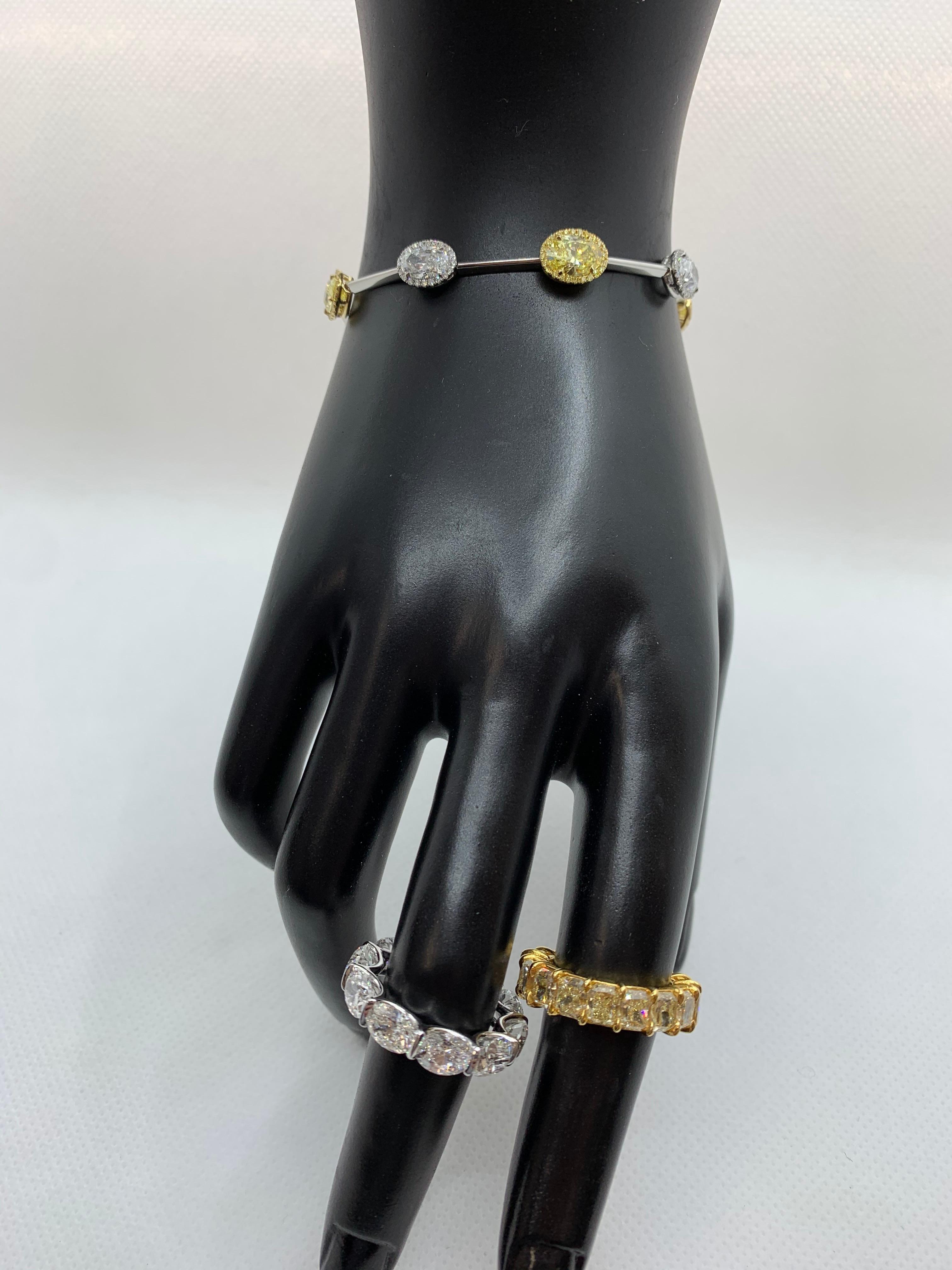 Women's or Men's GIA Certified 7.61 Carat Fancy Yellow and White Oval Diamond Bracelet For Sale