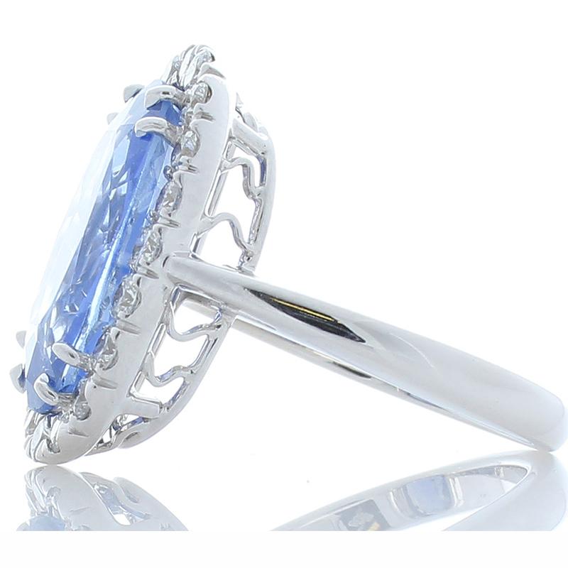 Contemporary GIA Certified 7.66 Carat Unheated Oval Blue Sapphire and Diamond Cocktail Ring