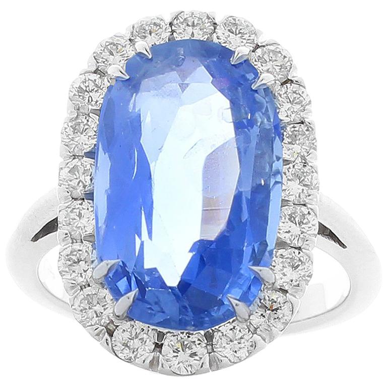 GIA Certified 7.66 Carat Unheated Oval Blue Sapphire and Diamond Cocktail Ring