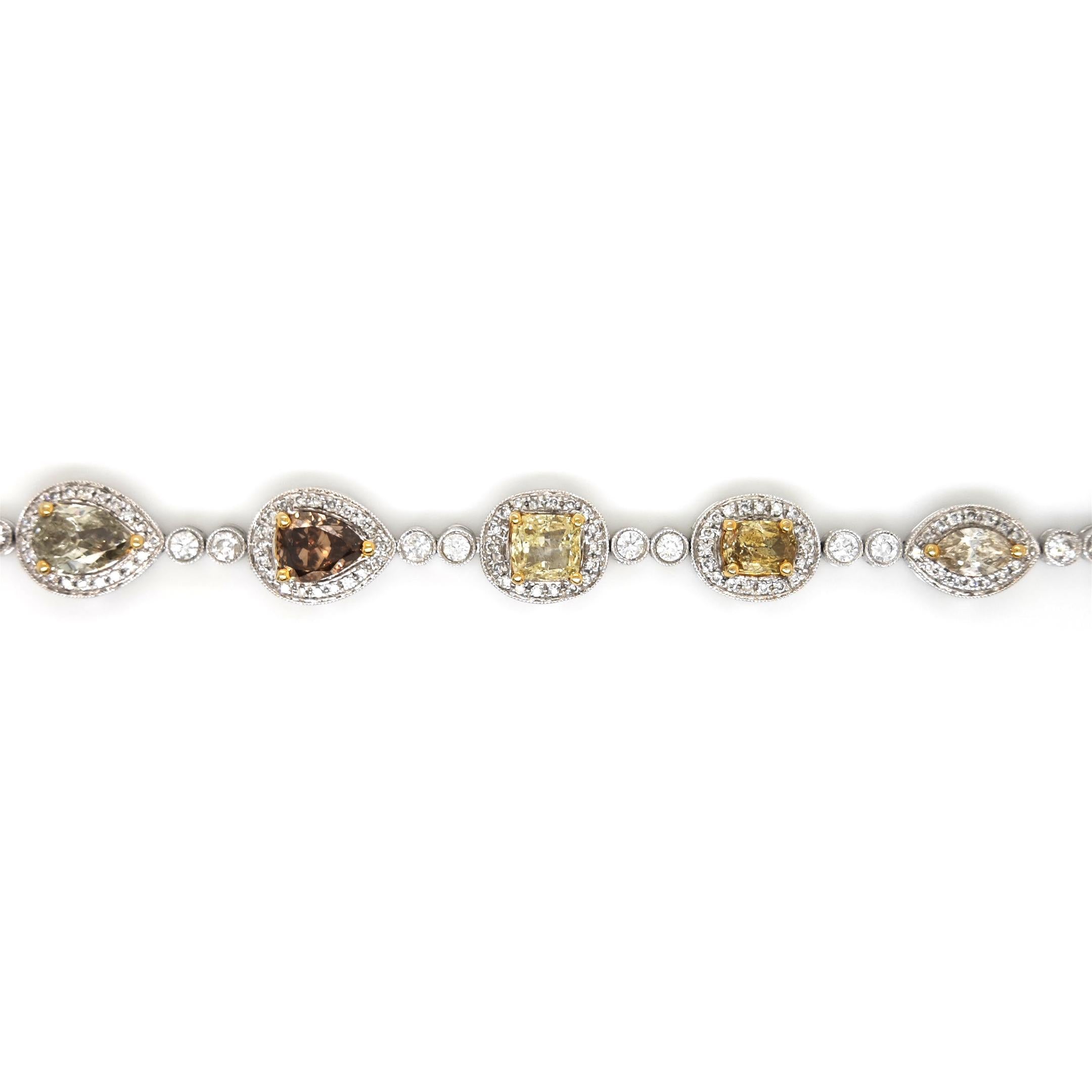 224 Multi-Color Diamonds: 7.66 Carats
Metal: 18K White and Yellow Gold, 16.90 Grams
Certificate # 2155550959
