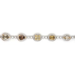 GIA Certified 7.66 Carats Multi-Color Diamond White and Yellow Gold Bracelet