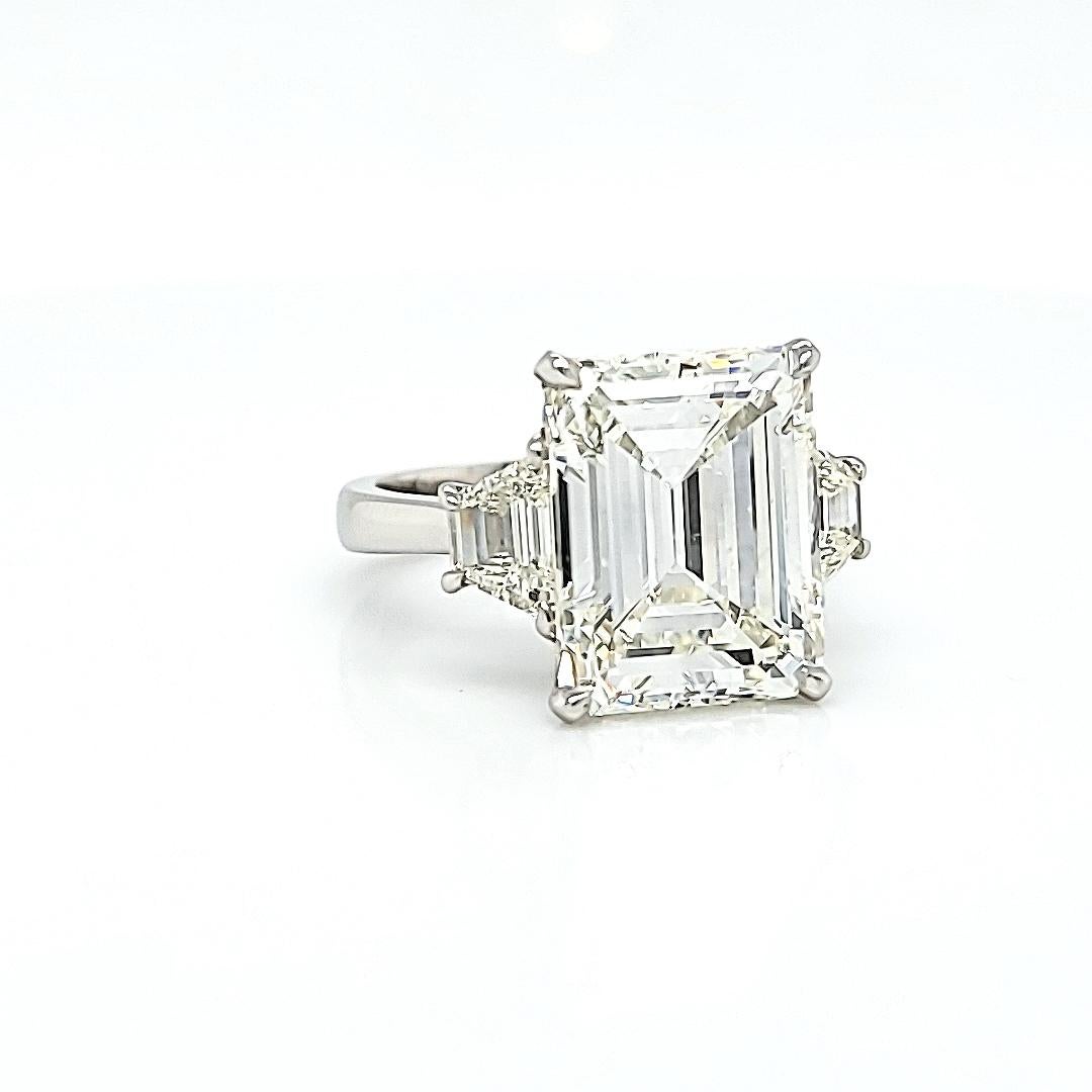 GIA Certified 7.68 Carat Emerald Cut Diamond Three Stone Ring In New Condition In New York, NY