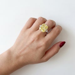 GIA Certified 7.69 Carat Fancy Intense Yellow Diamond Three-Stone Ring