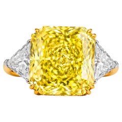 GIA Certified 7.69 Carat Fancy Intense Yellow Diamond Three-Stone Ring