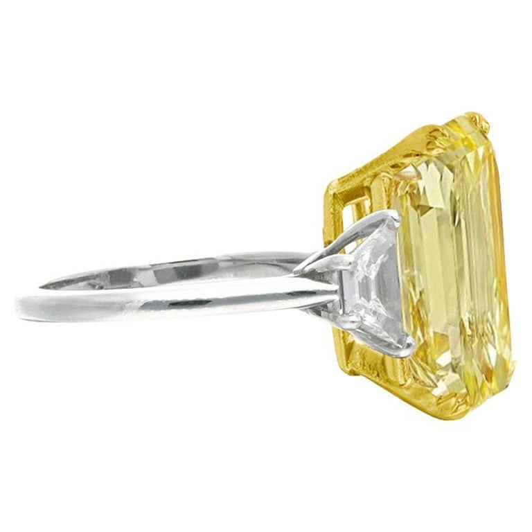 GIA Certified 7.70 Carat Emerald Cut Fancy Vivid Yellow Diamond Ring 