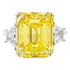 GIA Certified 7.70 Carat Emerald Cut Fancy Intense Yellow Diamond Ring