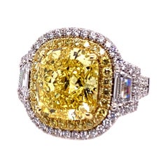 GIA Certified 7.74 Carat Natural Fancy Vivid Yellow Diamond Modern Platinum Ring