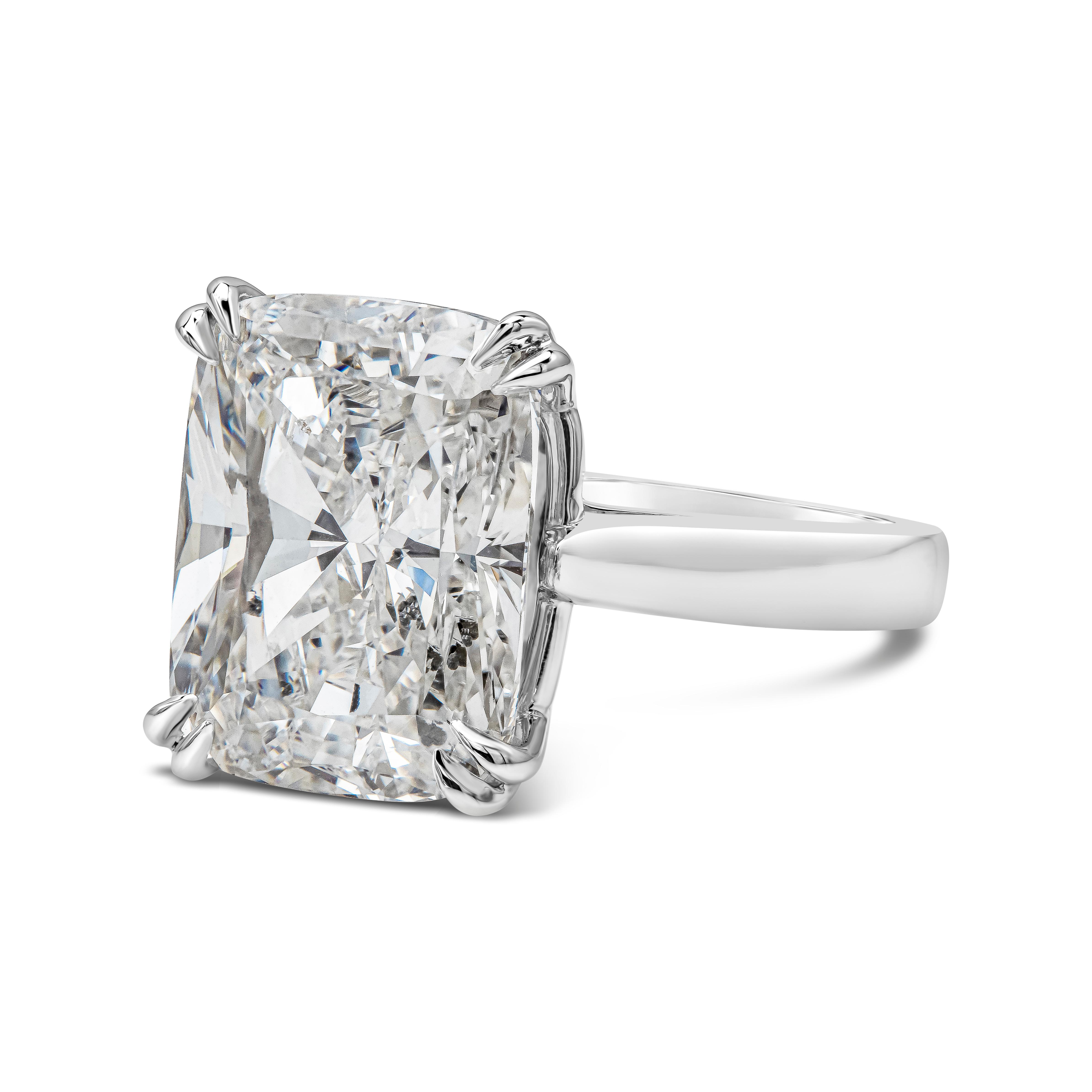 A classic solitaire engagement ring style showcasing an elongated cushion cut diamond weighing 7.76 carats total. The diamond was certified by GIA as F color, SI2 clarity. Made in platinum. Size 6 US resizable upon request.
