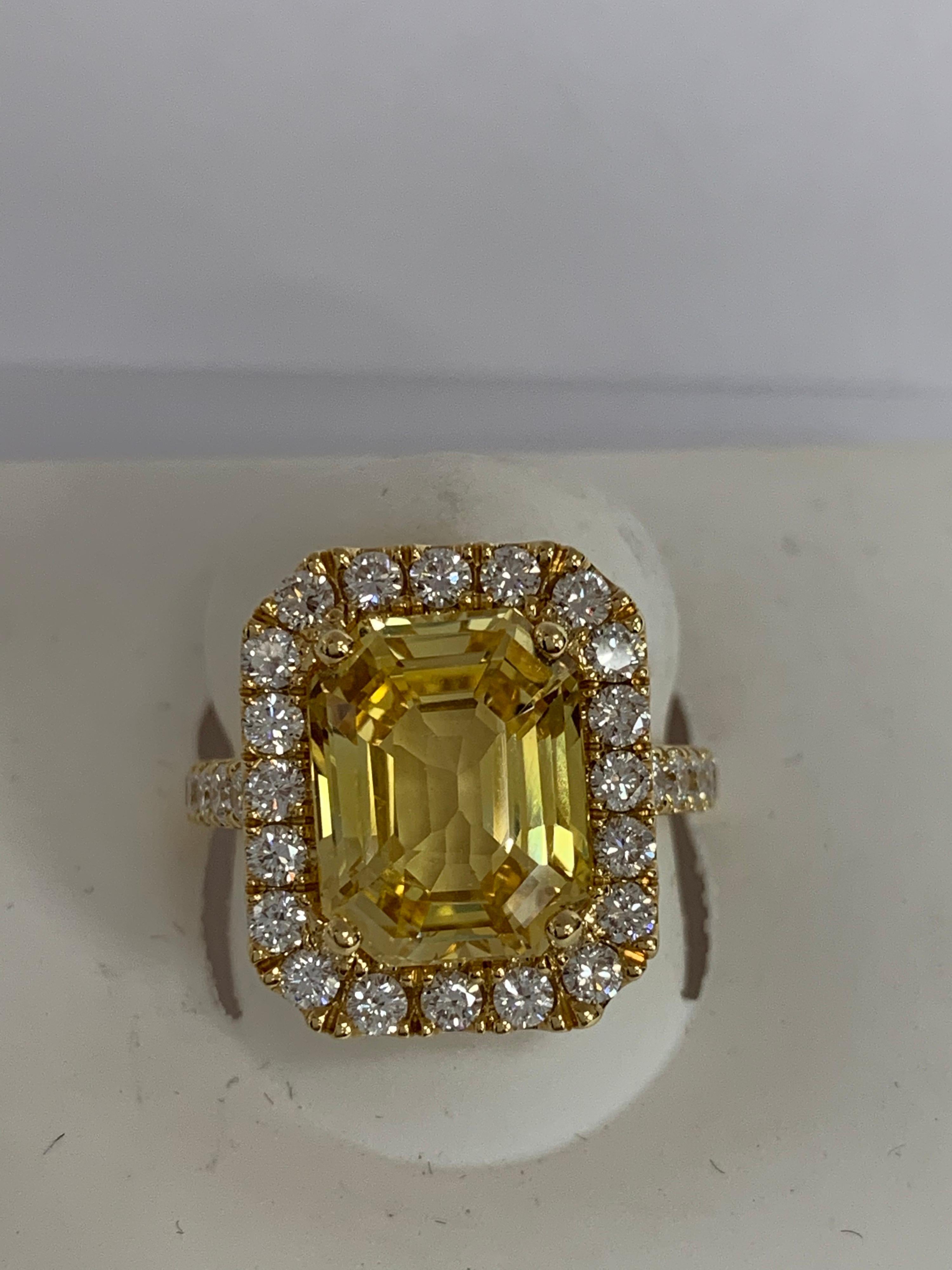 Emerald Cut GIA Certified 7.79 Carat Yellow Sapphire Diamond Ring