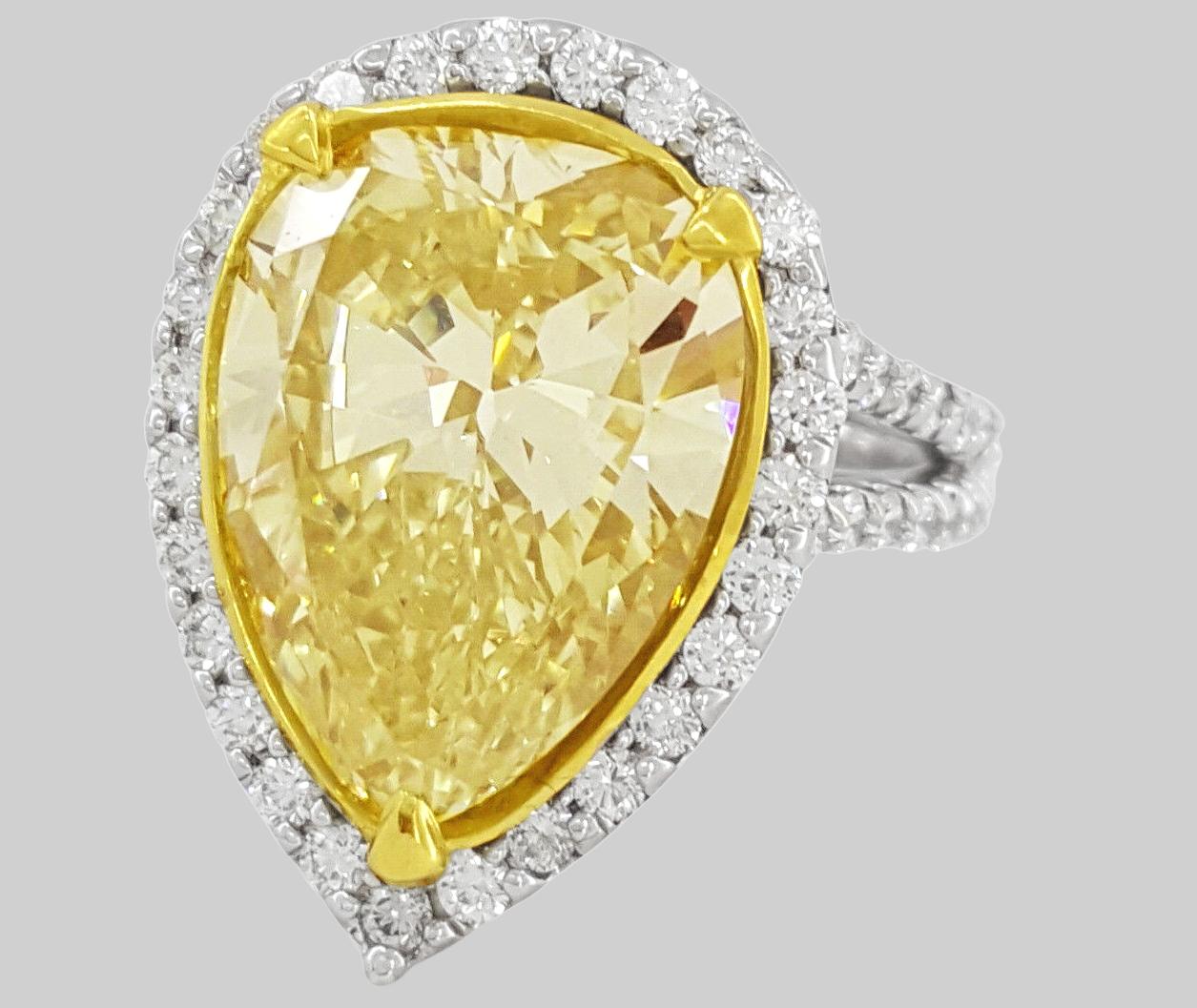 GIA Certified 7.90 Carat Pear Cut Fancy Yellow Diamond Solitaire Ring 