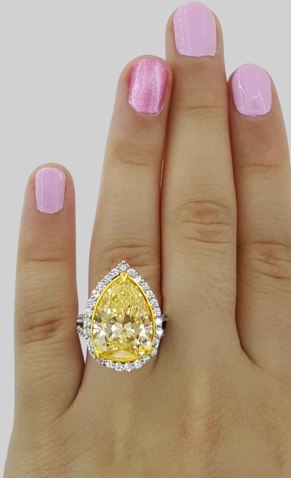 Modern GIA Certified 7.90 Carat Pear Cut Fancy Yellow Diamond Solitaire Ring For Sale