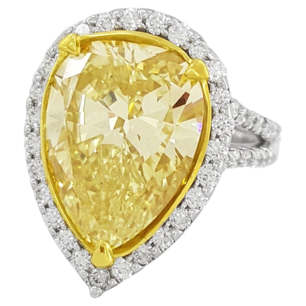 GIA Certified 7.90 Carat Pear Cut Fancy Yellow Diamond Solitaire Ring For Sale