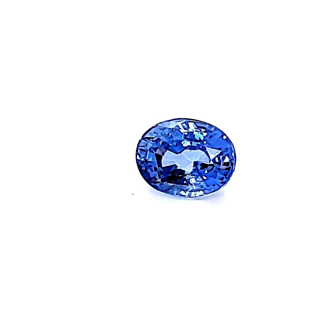 Women's GIA Certified 7.96 Carats Medium Blue Natural Sapphire Oval Cut UnHeated For Sale