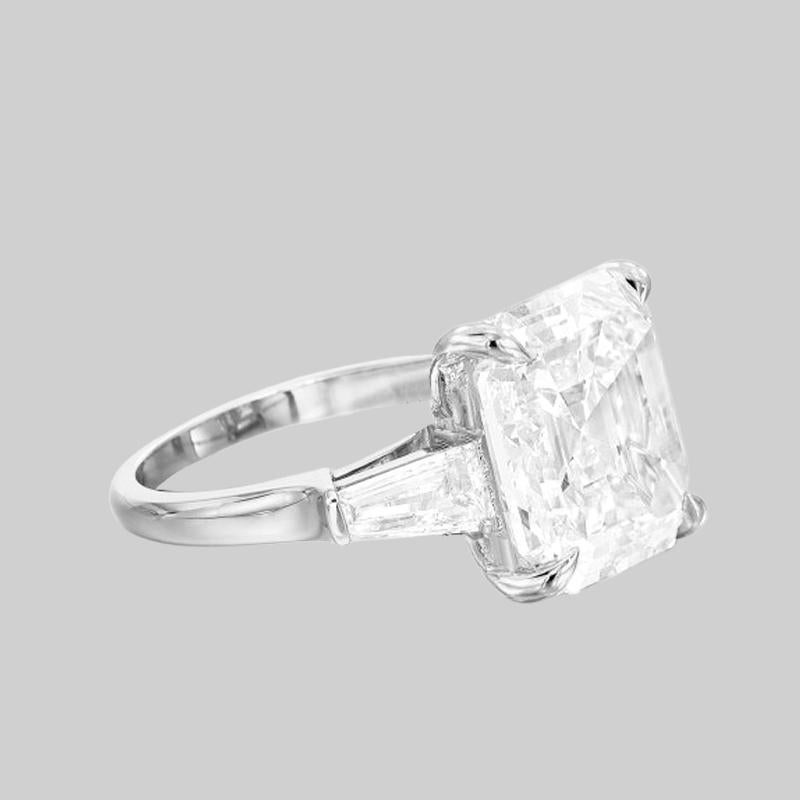 3 carat asscher cut diamond ring on finger