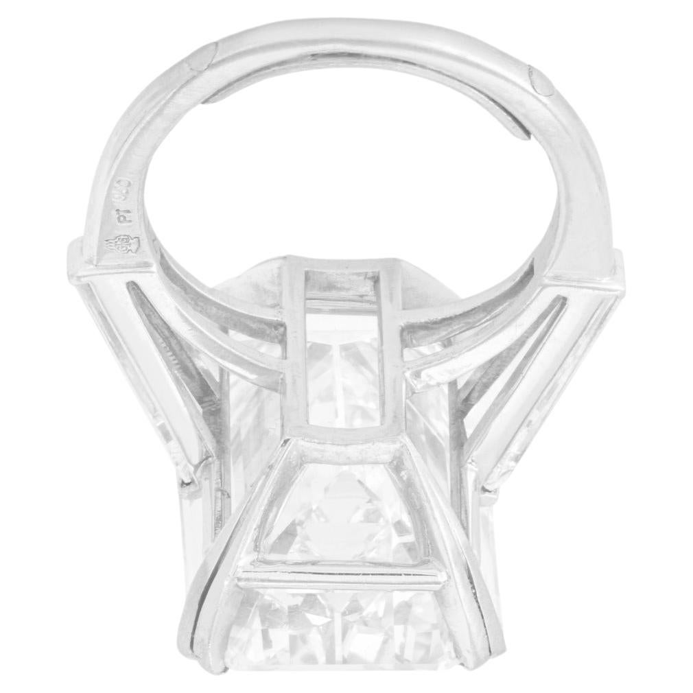 Exquisite Platinum Ring Featuring a 8-Carat Emerald-Cut Diamond with Trapezoid Side Stones

This luxurious platinum ring features a central 8 carat emerald-cut diamond that radiates unmatched elegance. Graded H for color, this diamond offers