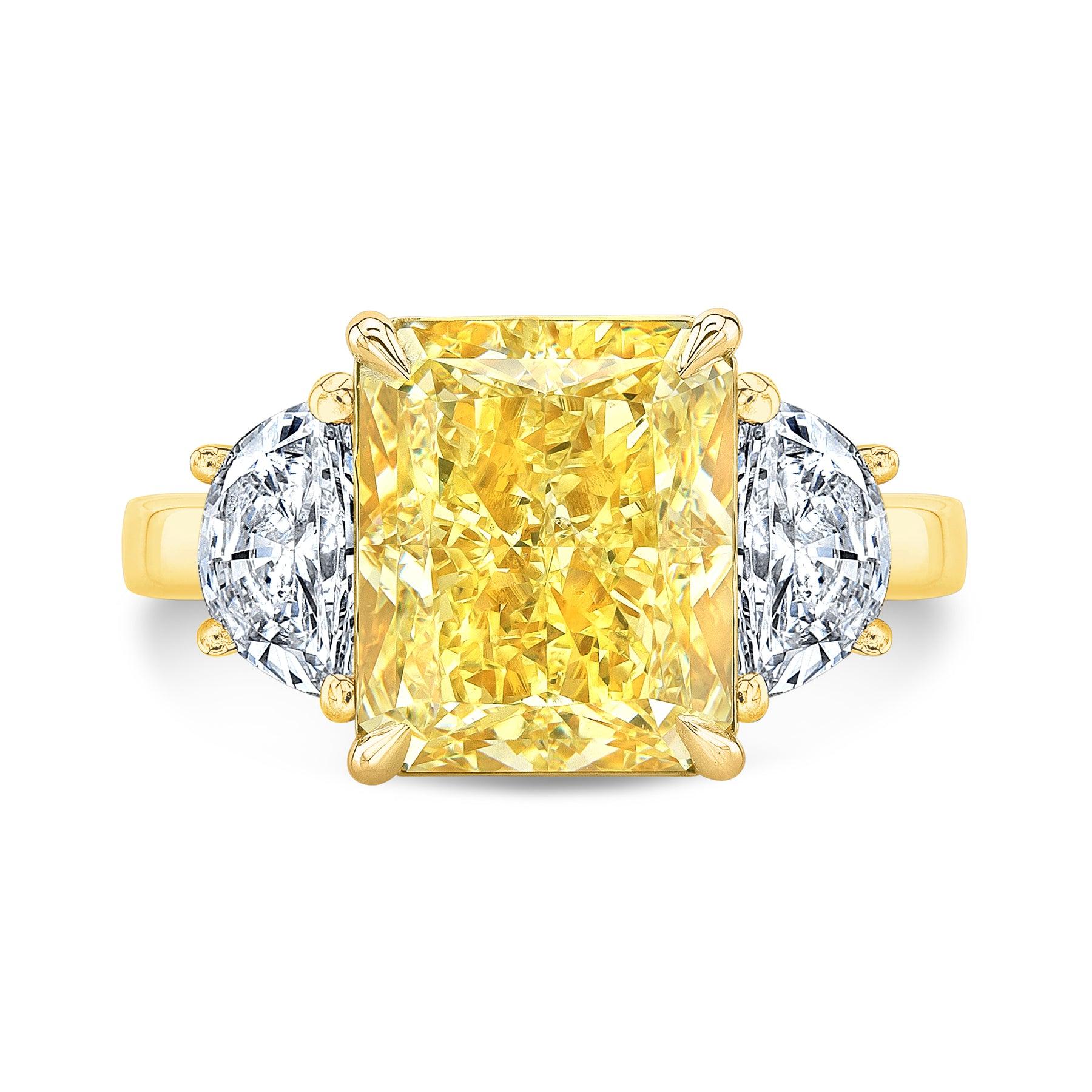 Discover the GIA Certified 8 Carat Canary Fancy Yellow Cushion Cut with Half Moons Diamond Ring, crafted in 18K gold. A radiant masterpiece of elegance and timeless luxury.

Experience the pinnacle of opulence with the GIA Certified 8 Carat Canary
