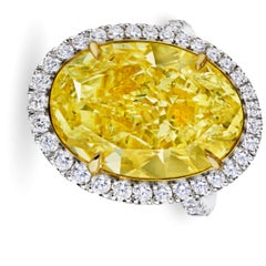 GIA Certified 8 Carat Fancy Yellow Oval Cut Diamond Halo Ring