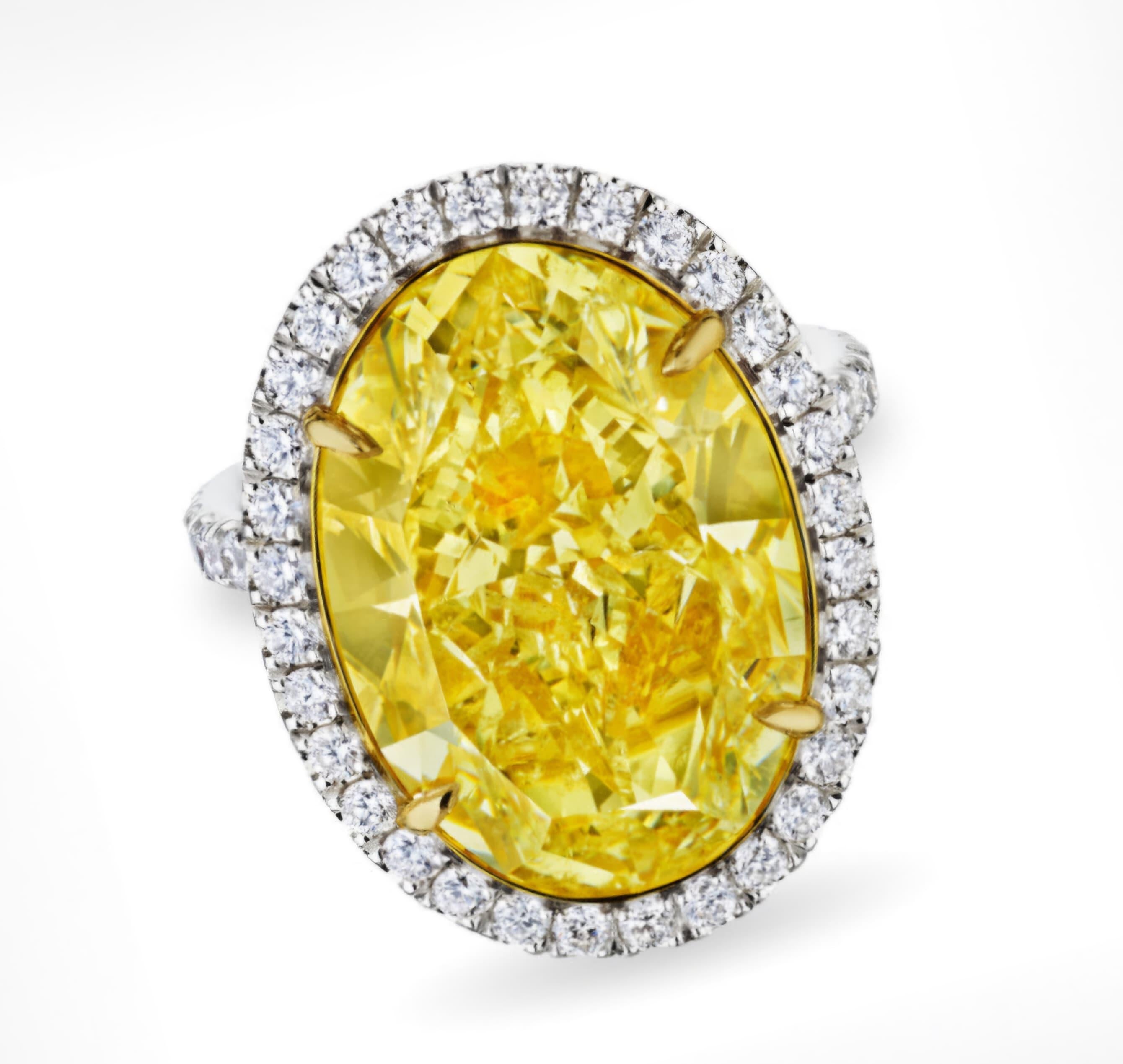 GIA Certified 8 Carat Fancy Yellow Oval Cut Diamond Halo Ring In New Condition For Sale In Mumbai, IN