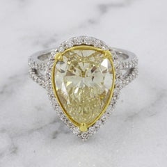 GIA Certified 8 Carat Fancy Yellow Pear Diamond Halo Engagement Ring