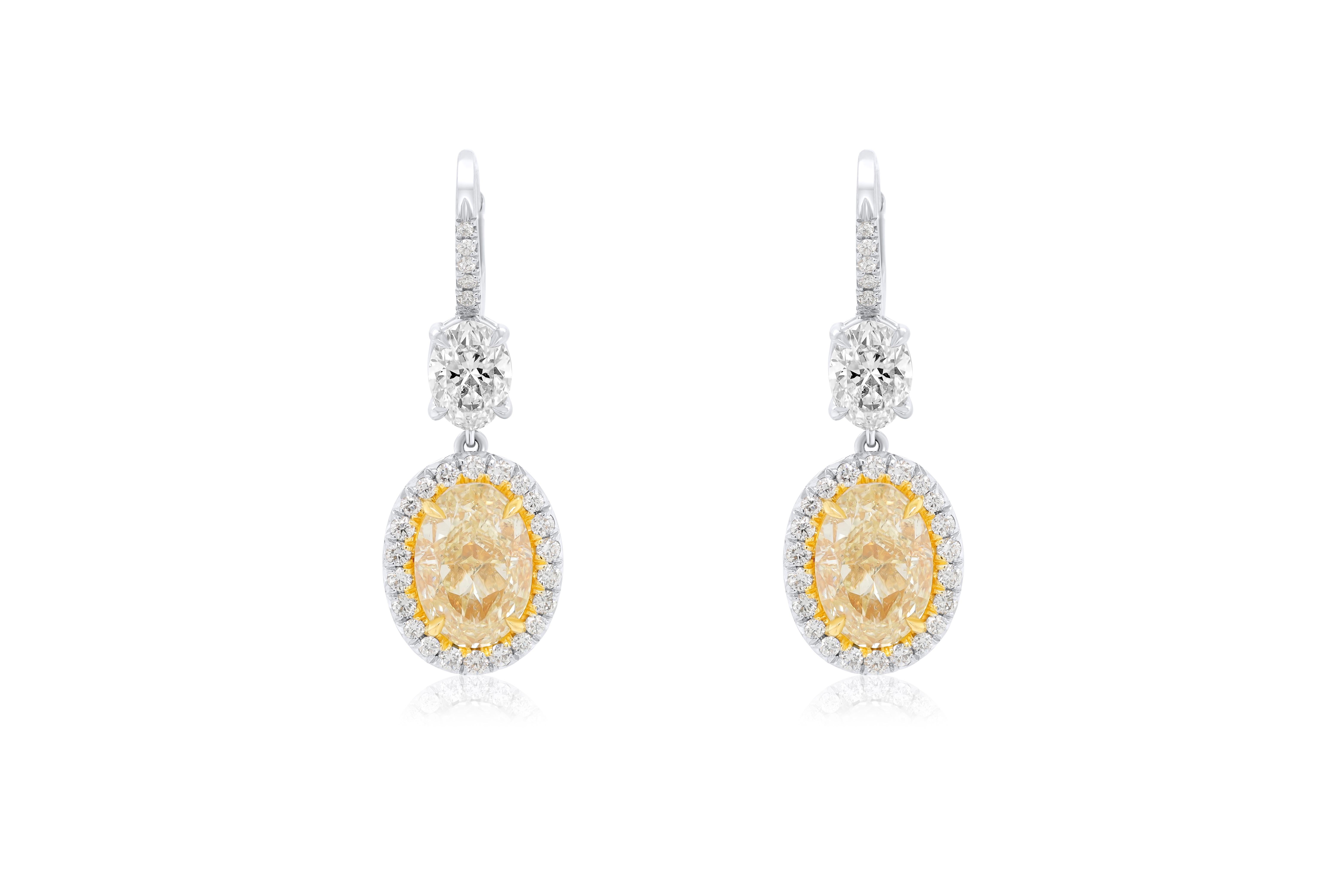 Modern Diana M. GIA Certified 8 Carat Oval Shaped Yellow Diamond Earrings For Sale