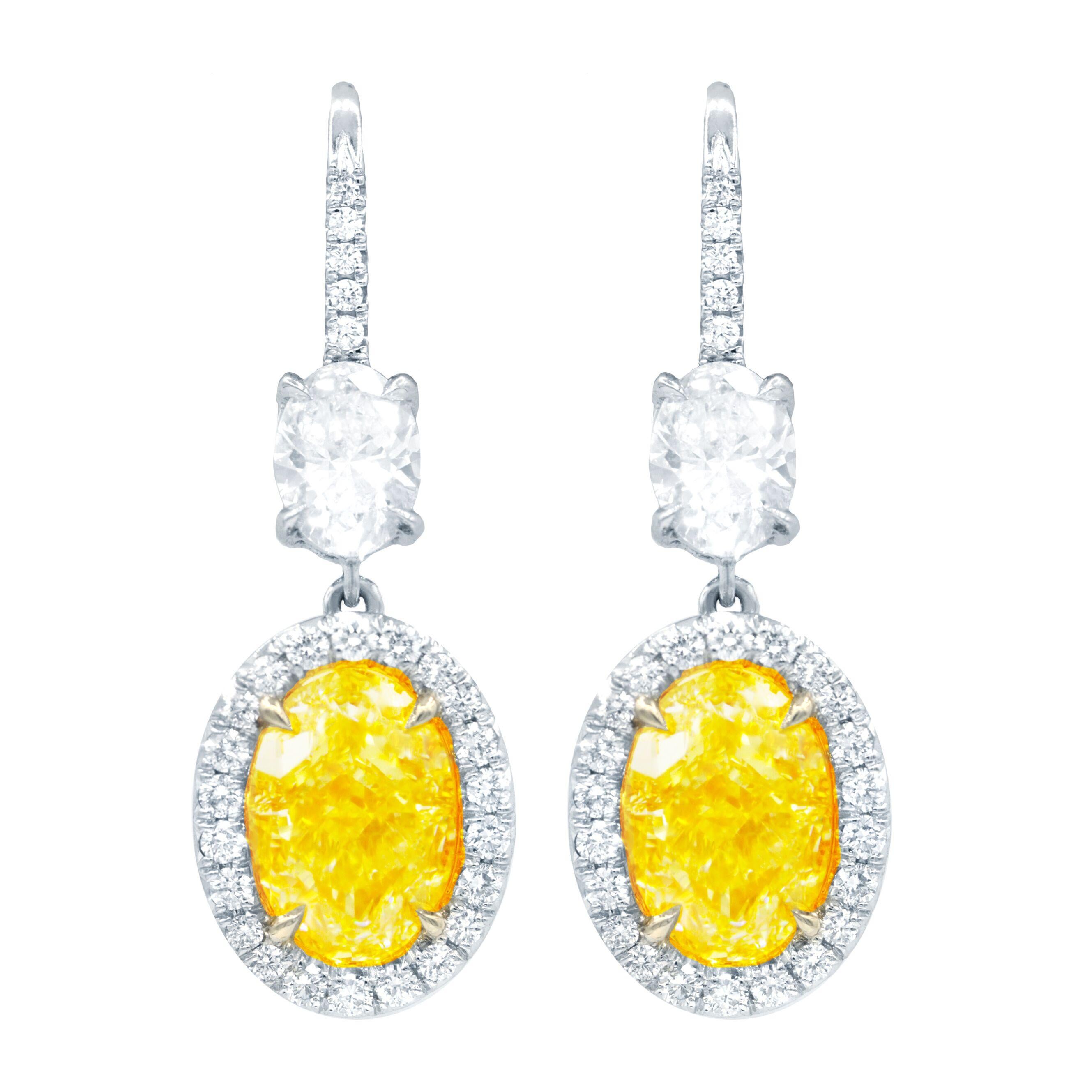 Oval Cut Diana M. GIA Certified 8 Carat Oval Shaped Yellow Diamond Earrings For Sale