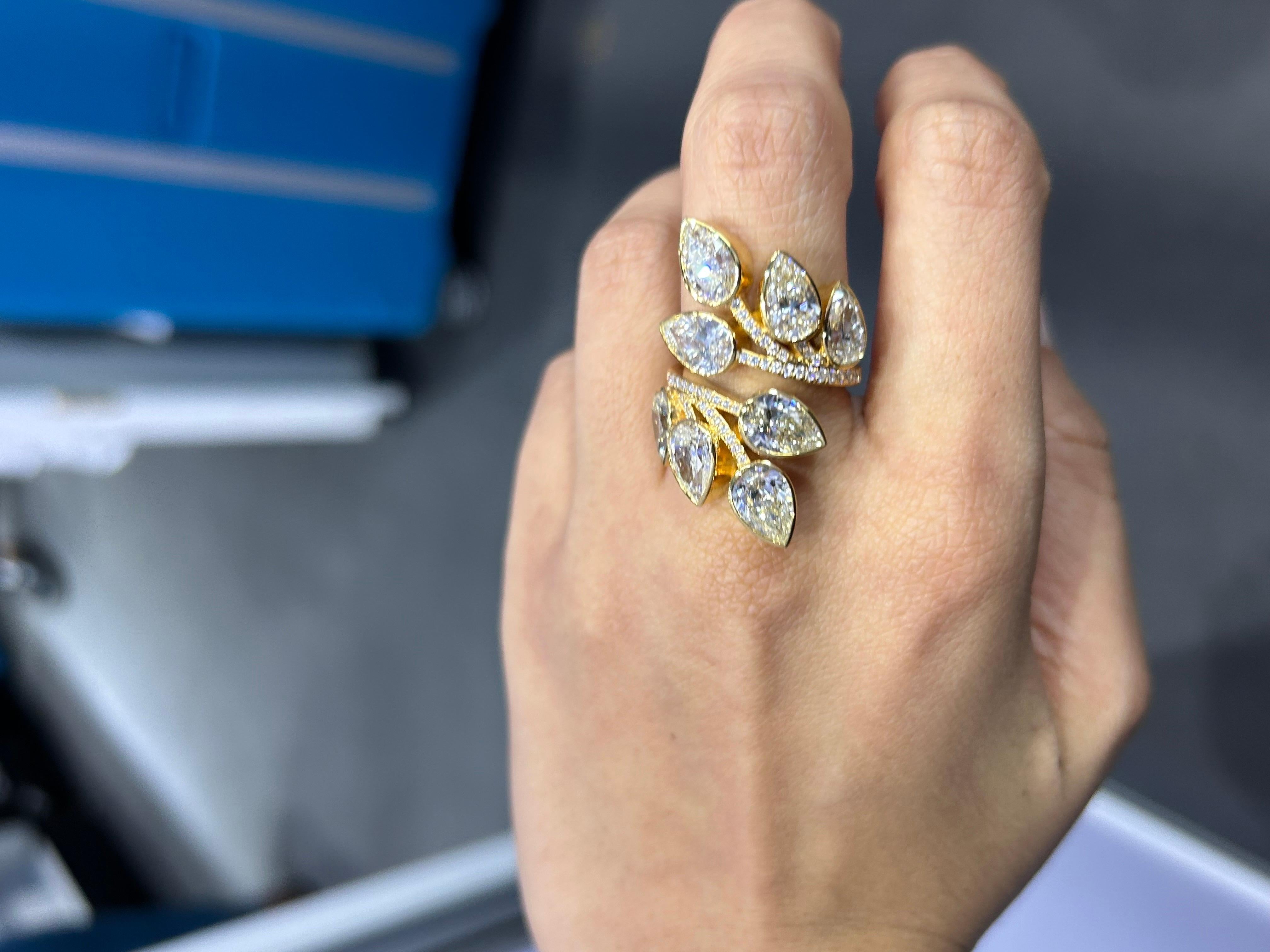 All 8 pieces are GIA certified, L/M color, VS/SI quality - weighing average 1 carat each. Set in solid 18K Yellow Gold. The ring is currently sized at US7, can be resized. 