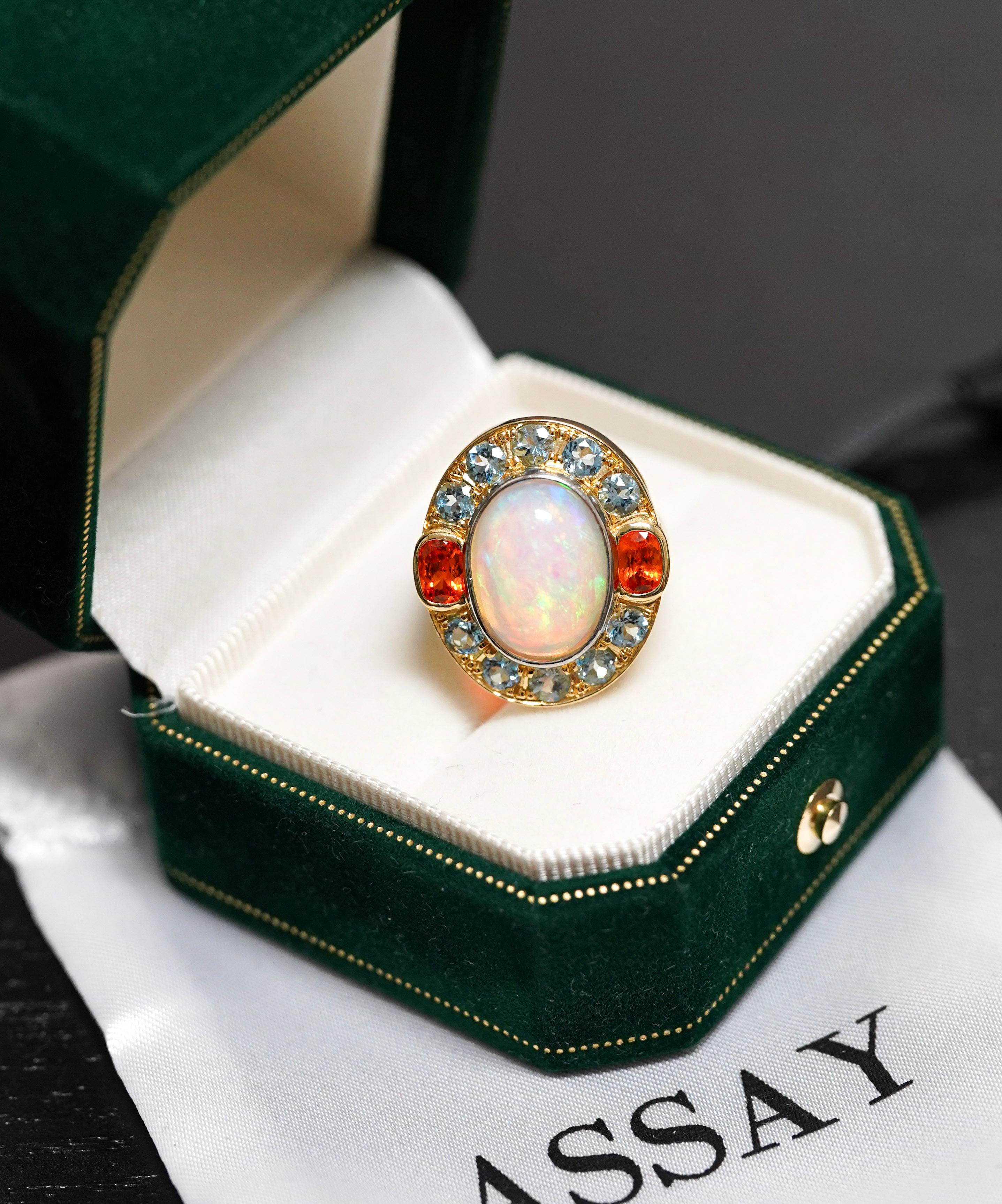 Cabochon GIA Certified 8 Carat White Opal With Orange Garnet & Aquamarine Halo Ring For Sale