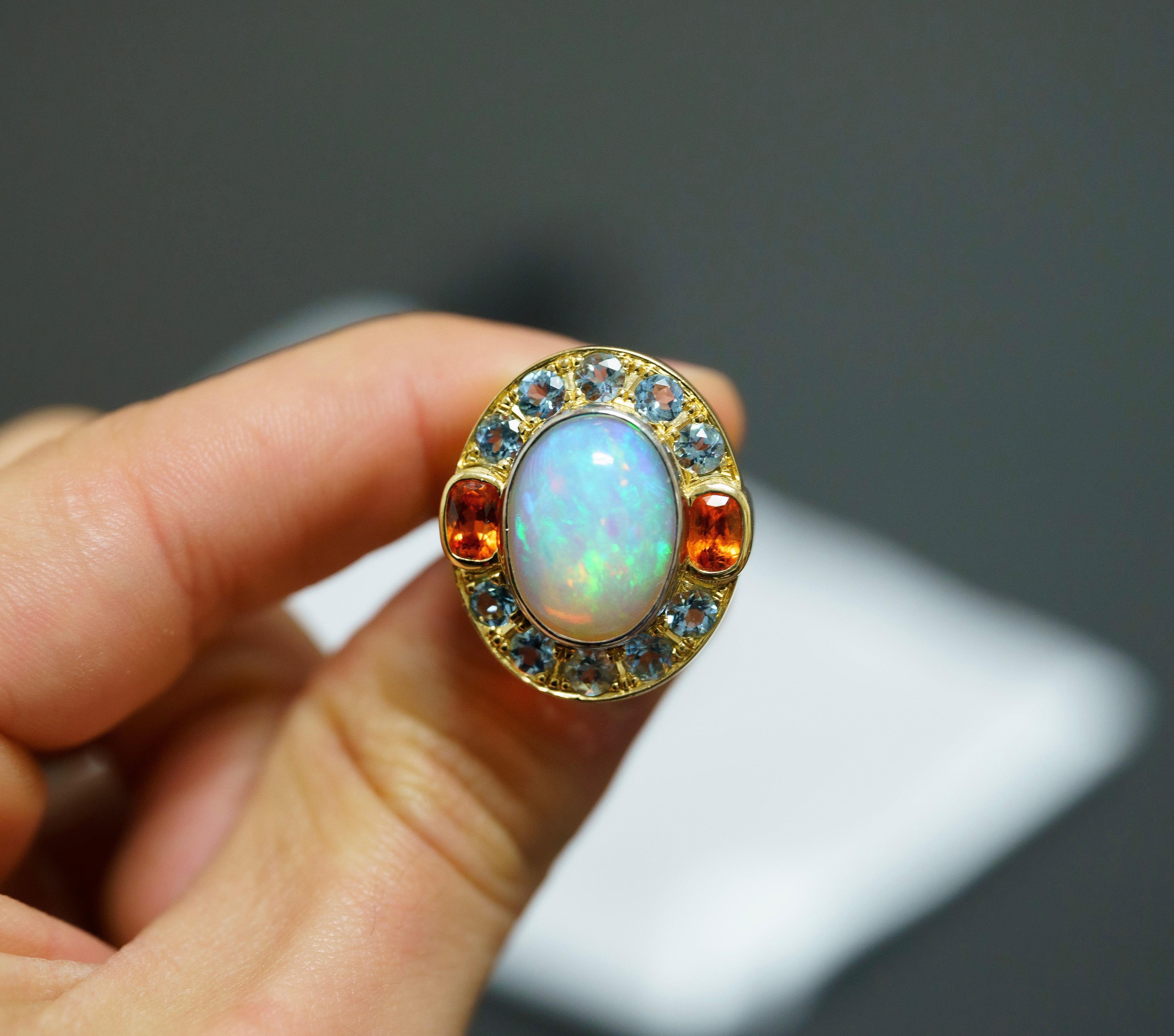Women's GIA Certified 8 Carat White Opal With Orange Garnet & Aquamarine Halo Ring For Sale