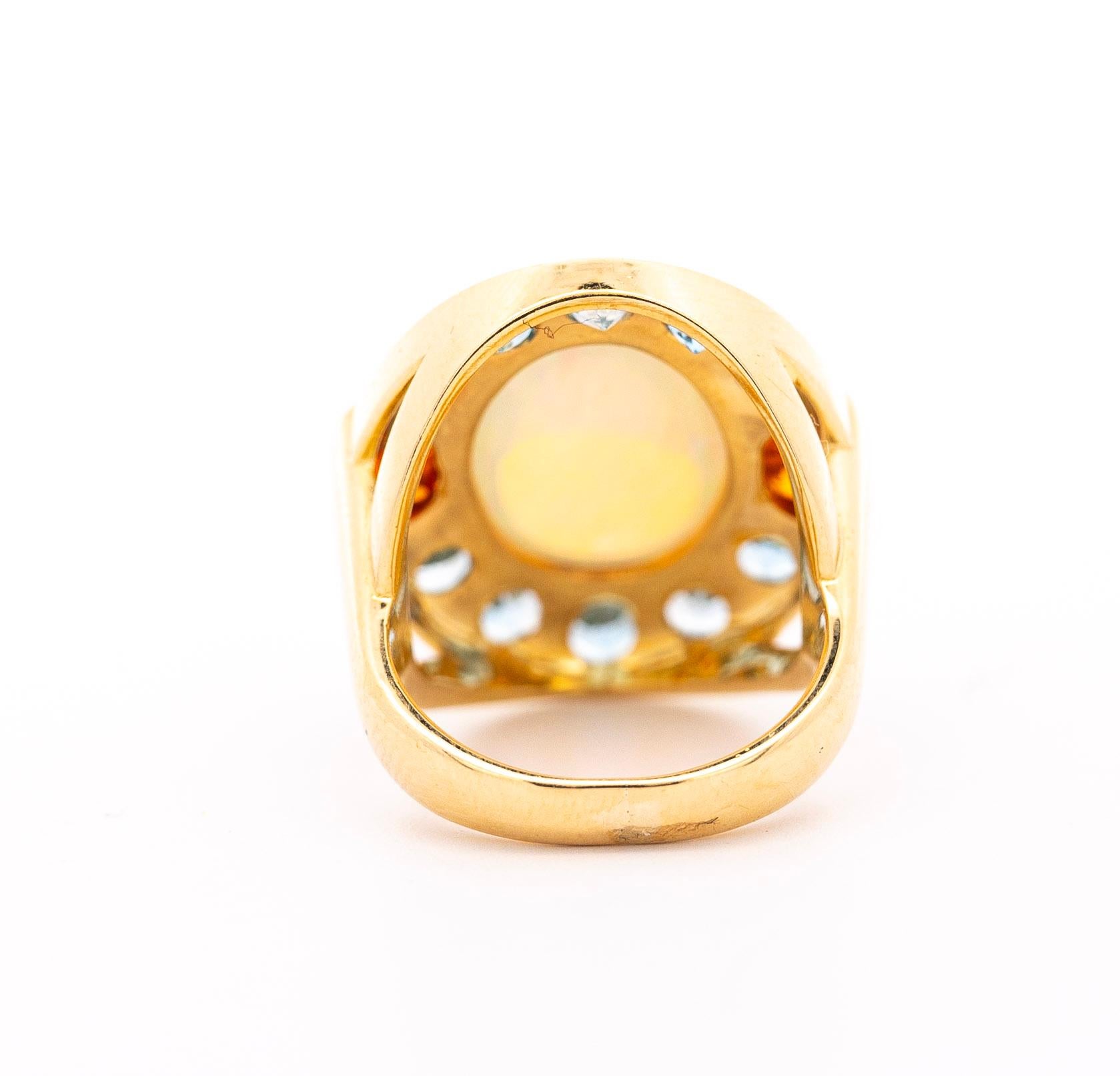GIA Certified 8 Carat White Opal With Orange Garnet & Aquamarine Halo Ring For Sale 1