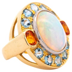 Vintage GIA Certified 8 Carat White Opal With Orange Garnet & Aquamarine Halo Ring