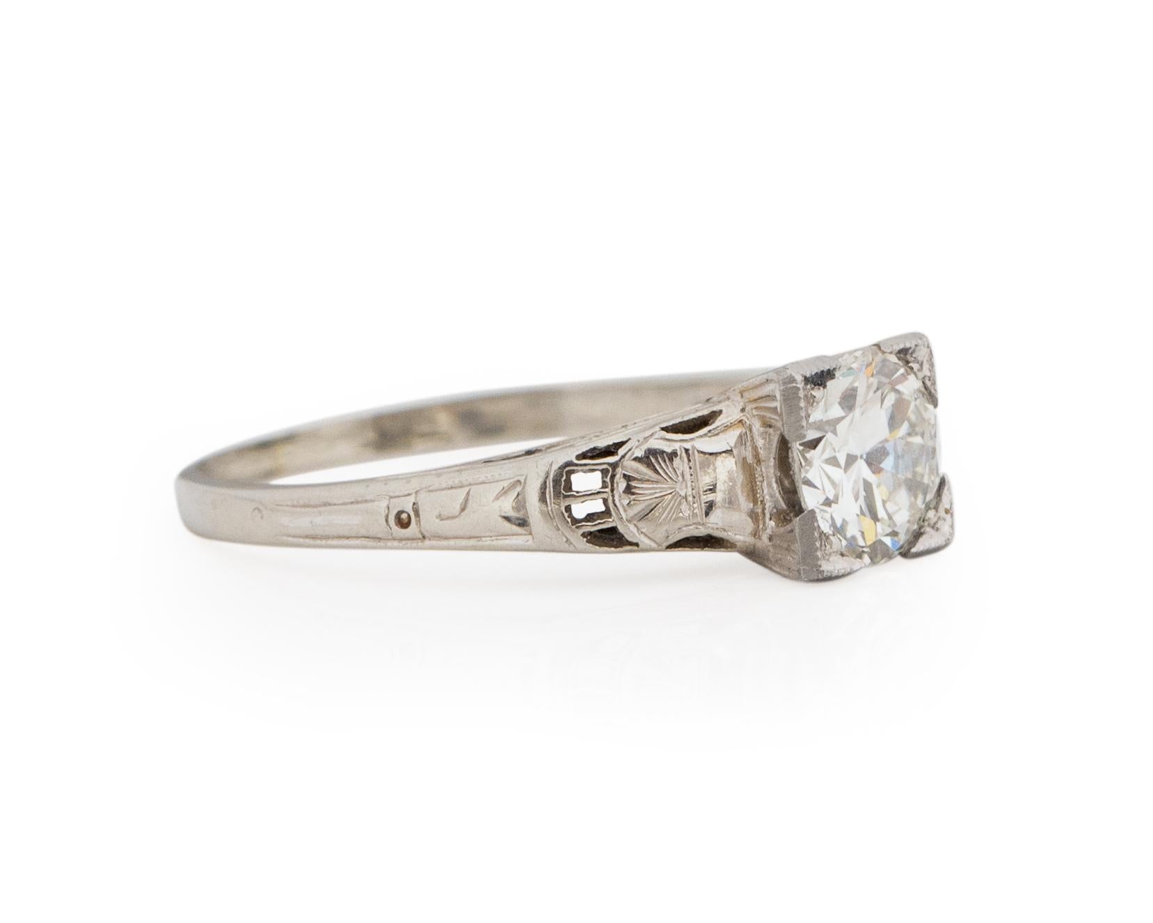 Ring Size: 6.25
Metal Type: 18karat White Gold [Hallmarked, and Tested]
Weight: 2.0 grams

Center Diamond Details:
GIA REPORT #: 6214895907
Weight: .80carat
Cut: Old European brilliant
Color: I
Clarity: VS2
Measurements: 6.11mm x 5.94mm x